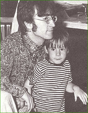 9: A somewhat candid shot of John Lennon with his son, Julian at their home in Kenwood, circa 1966. Lennon was in his psychedelic phase, spending quite a lot of time at home with his wife, Cynthia, and their young son.