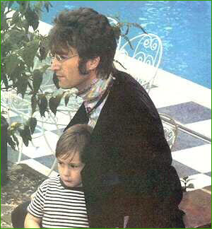 4: John Lennon embraces his young son, Julian, near the swimming pool at his home in Kenwood. Moments like this between famous father and sensitive son were not often captured on film. This photo session took place in 1966.