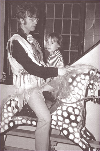 7: John Lennon and his son, Julian, take a ride on an elaborate rocking horse in their home at Kenwood, Weybridge, England. It was hard to hide the fact the father and son had a somewhat distant relationship with each other. This photo session took place in 1966.